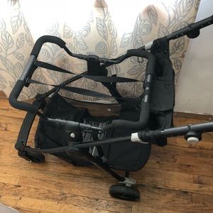 Baby’s black stroller frame